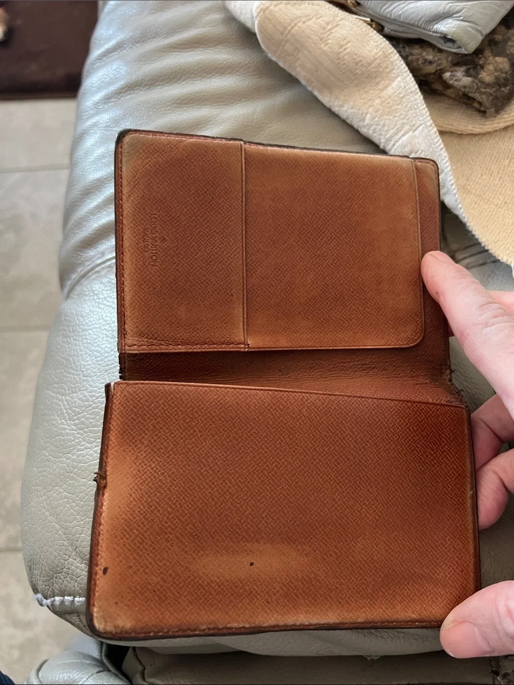Louis Vuitton Monogram bifold wallet in Brown and Tan
